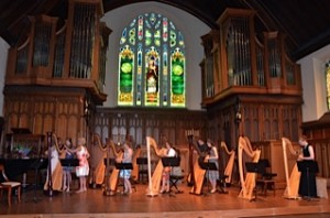 Former students prepare to perform during Stephanie Curcio’s retirement retrospective.event in Exeter, N.H., in June 2014.