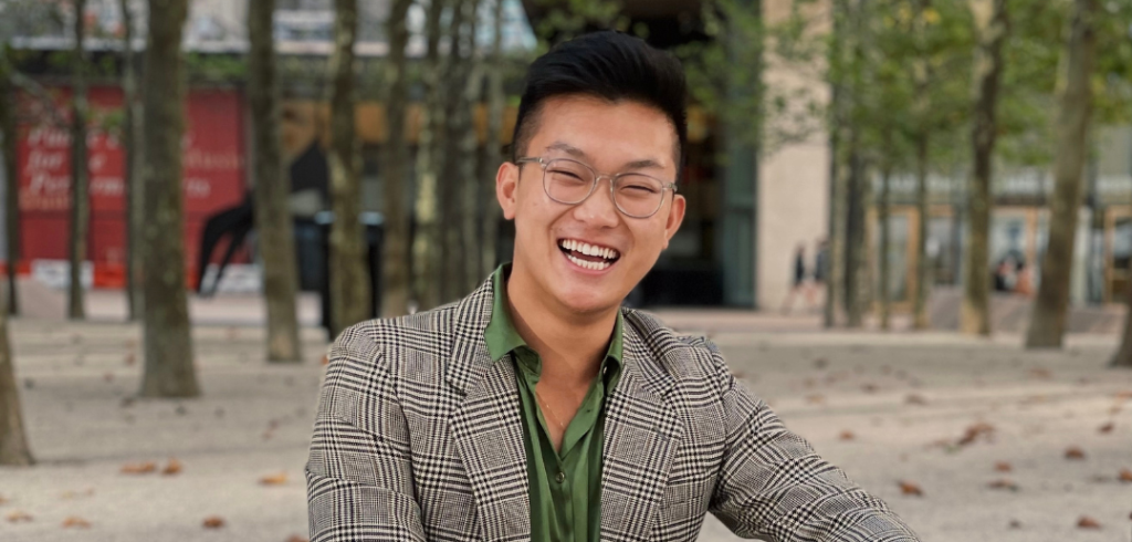 Adam_Phan_NYCB Headshot of Adam Phan smiling, taken outdoors